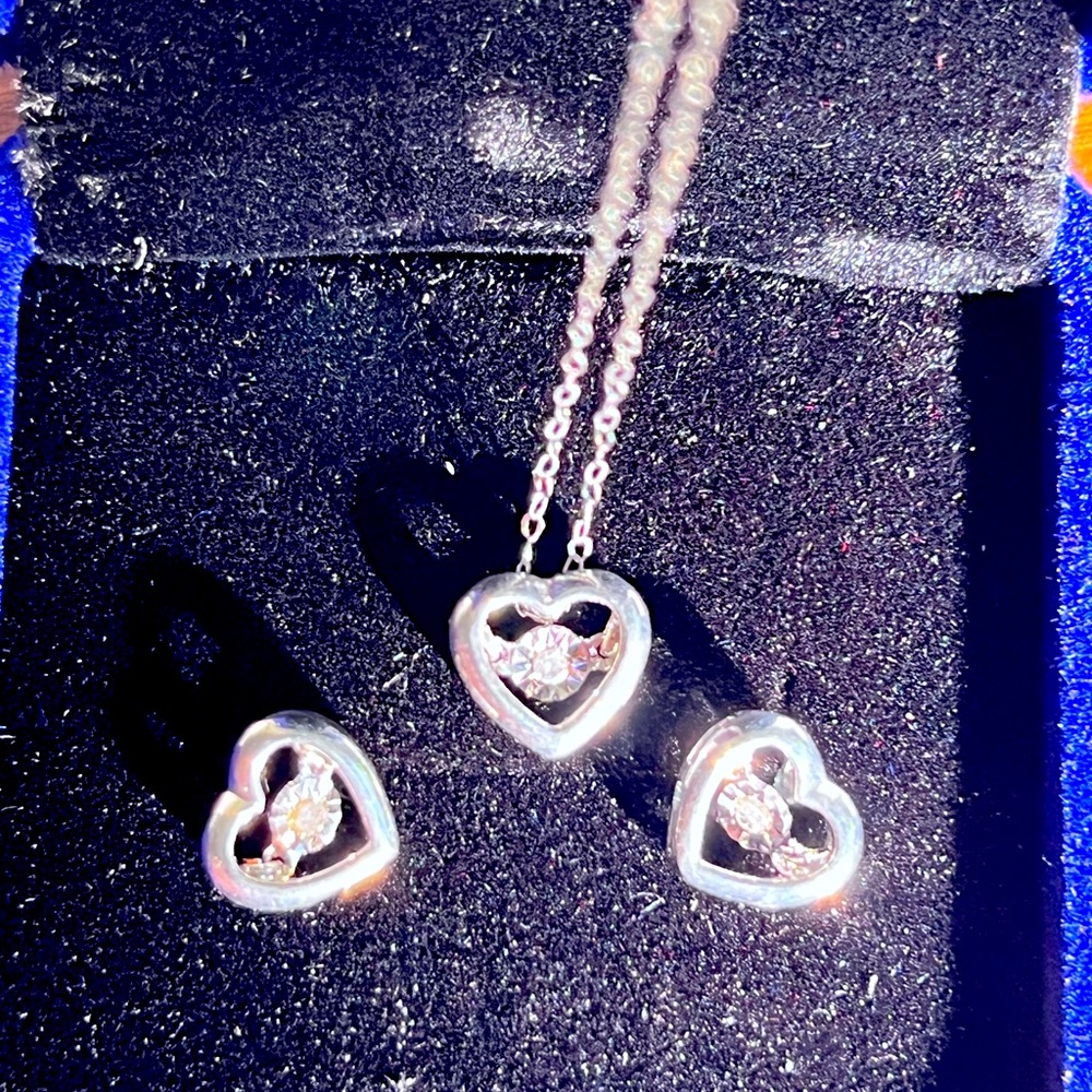 Dainty set of dancing heart earrings and necklace in white gold